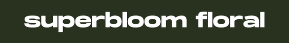 White text reading 'superbloom floral' on a dark olive green background.
