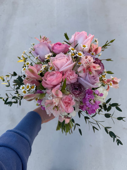 garden style bridal bouquet created with garden roses, ranunculus, hydrangea, stock, chamomile, greenery